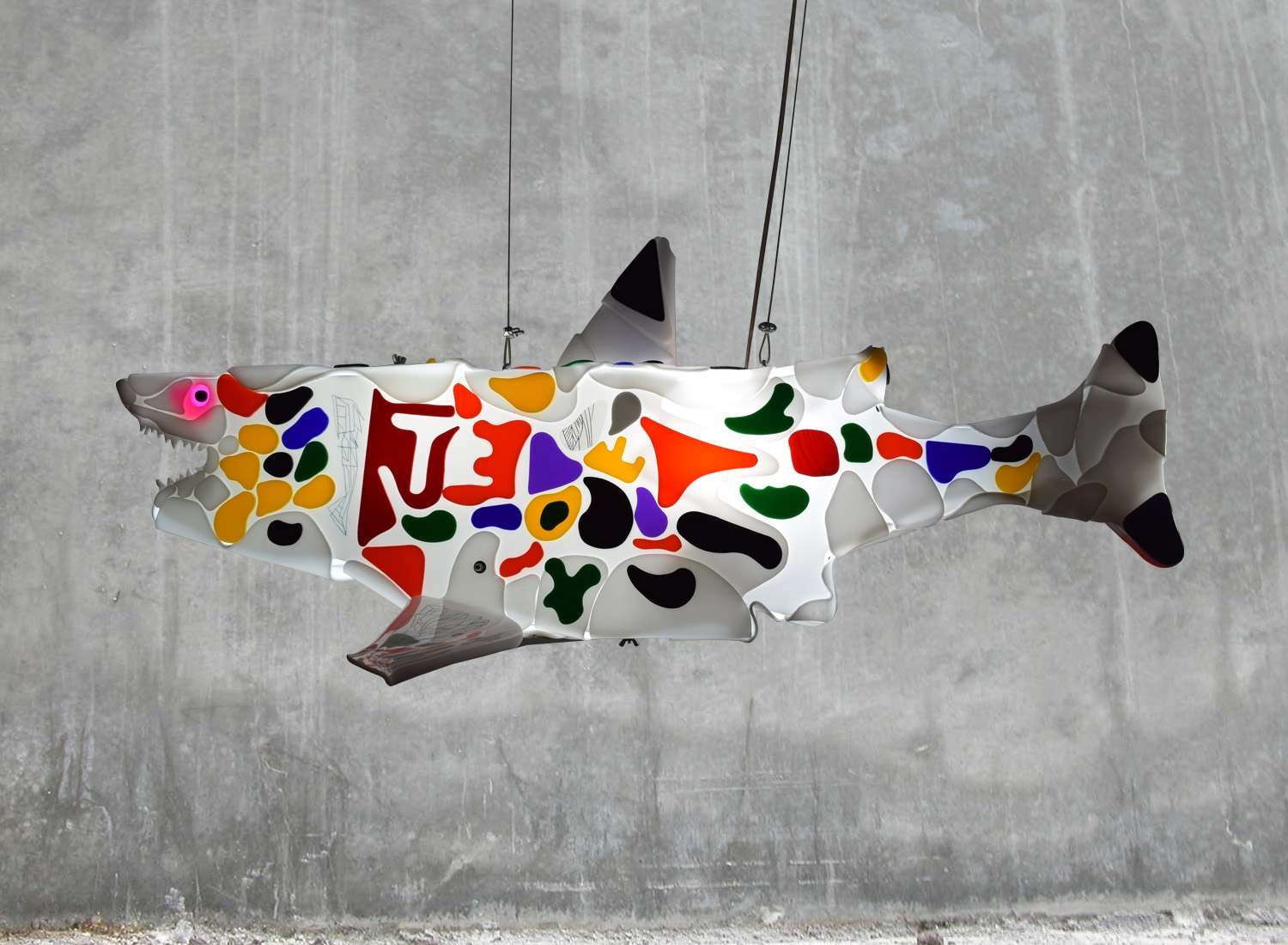 shark sculpture on a concrete background