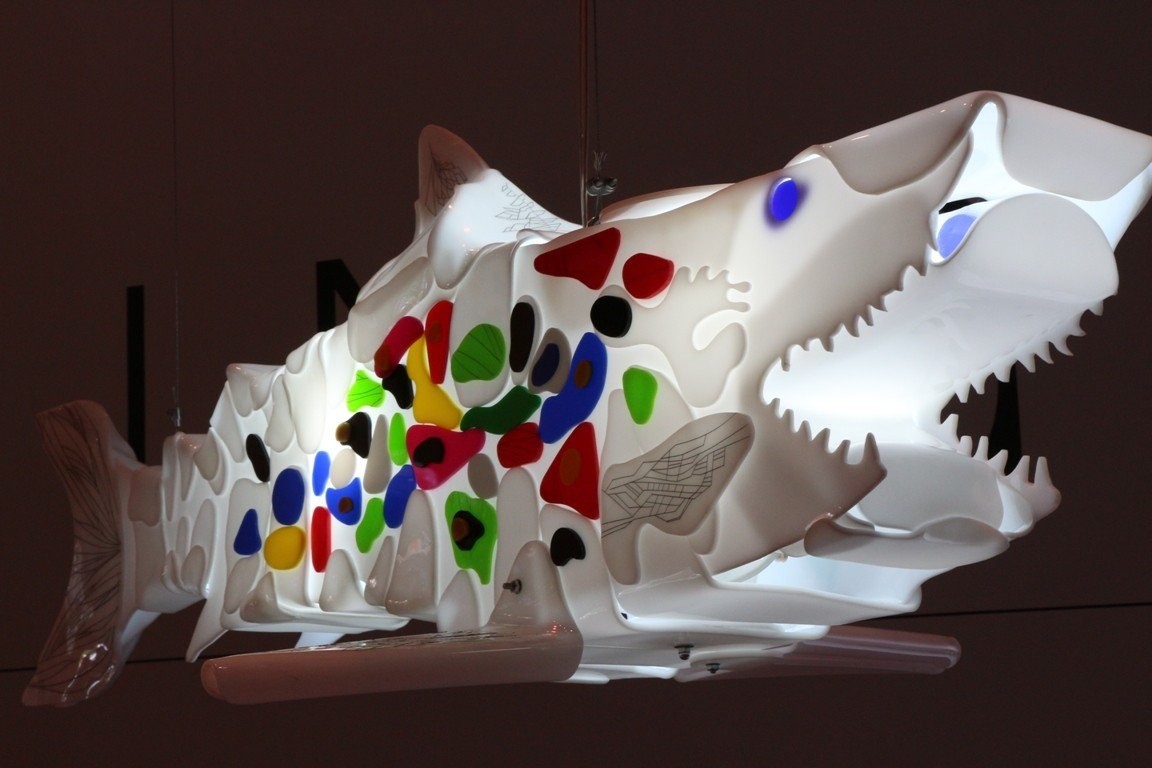 Shark sculpture made of Plexiglas with light inside.